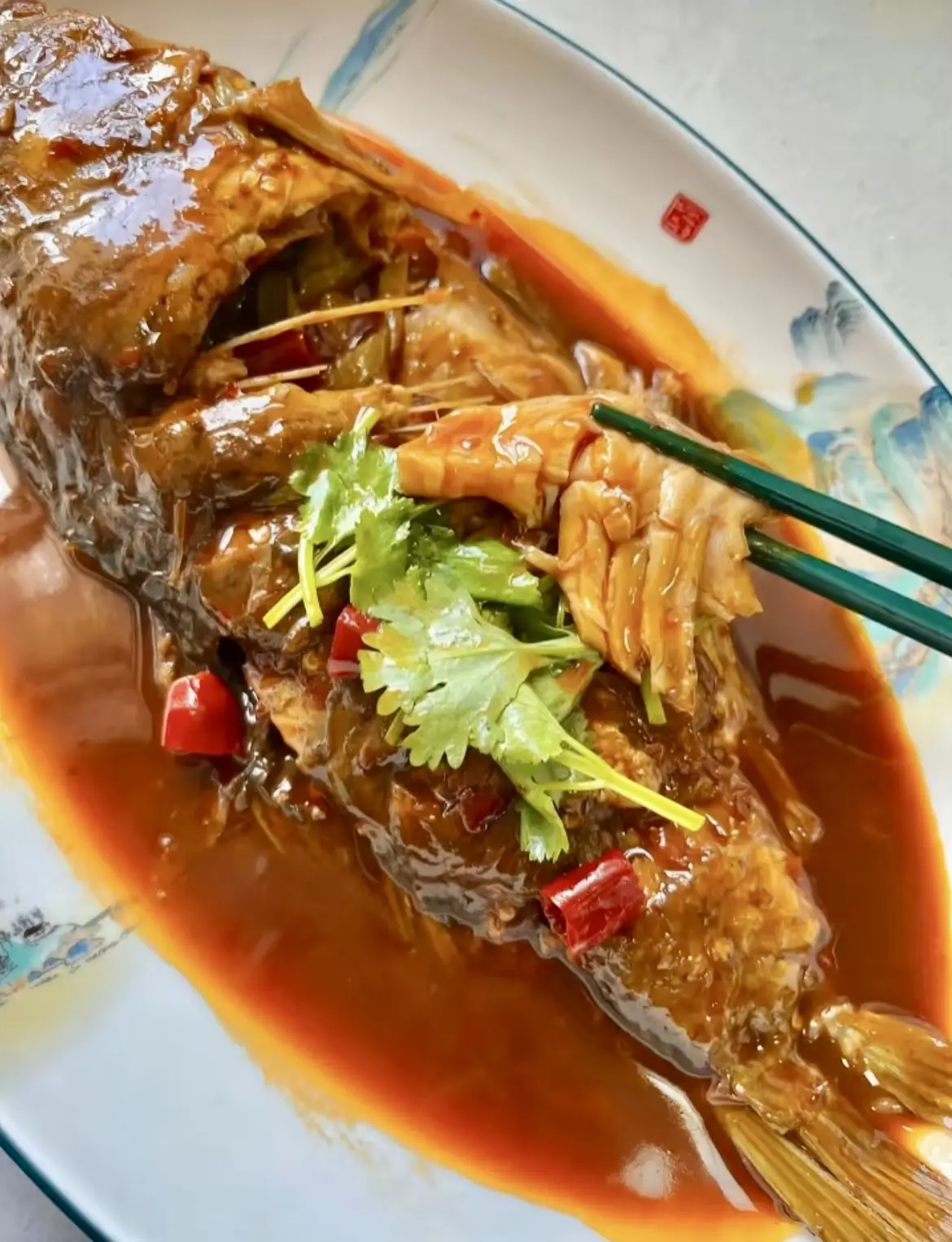 探索中国传统美食：红烧鲤鱼的制作与文化传承  第1张